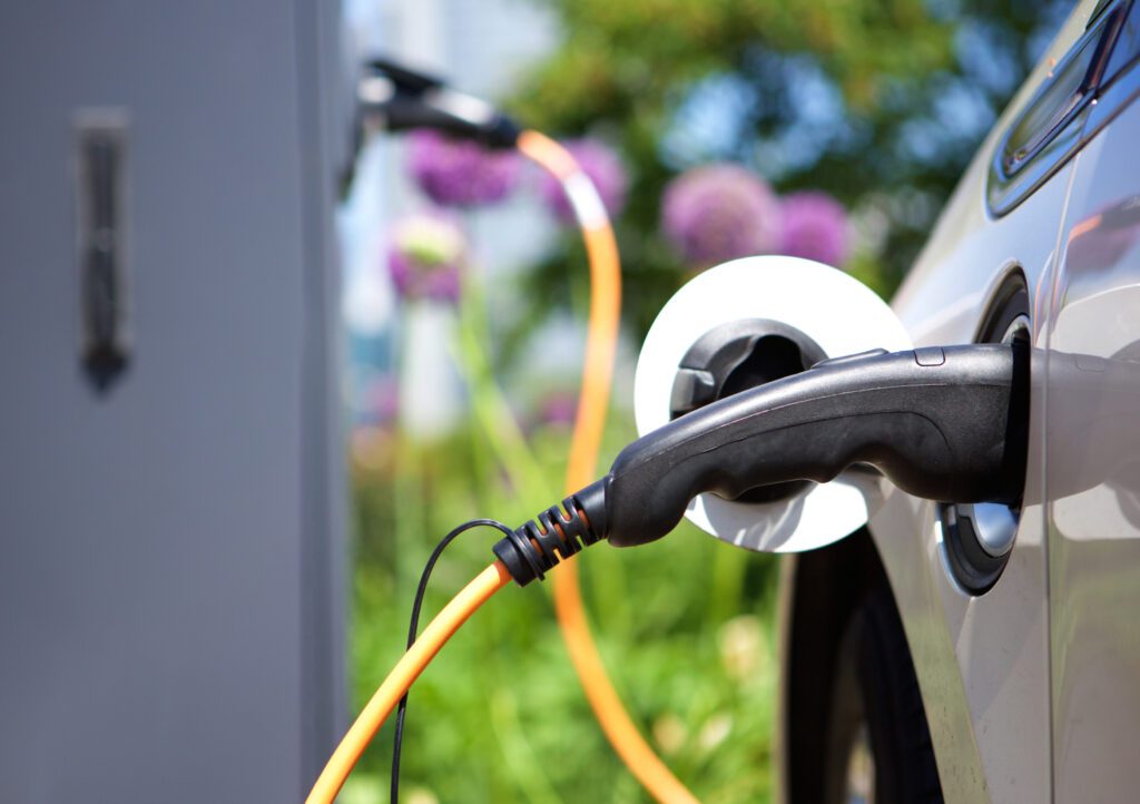 A close up of an electric car charging